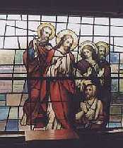 Stained glass window of Jesus and the apostles
